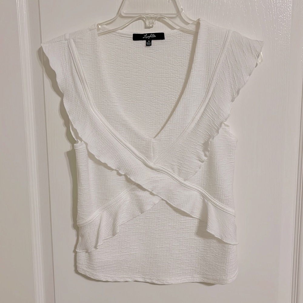White Sleeveless Blouse